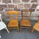 4 mismatched curved wooden bistro chairs