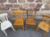 4 mismatched curved wooden bistro chairs