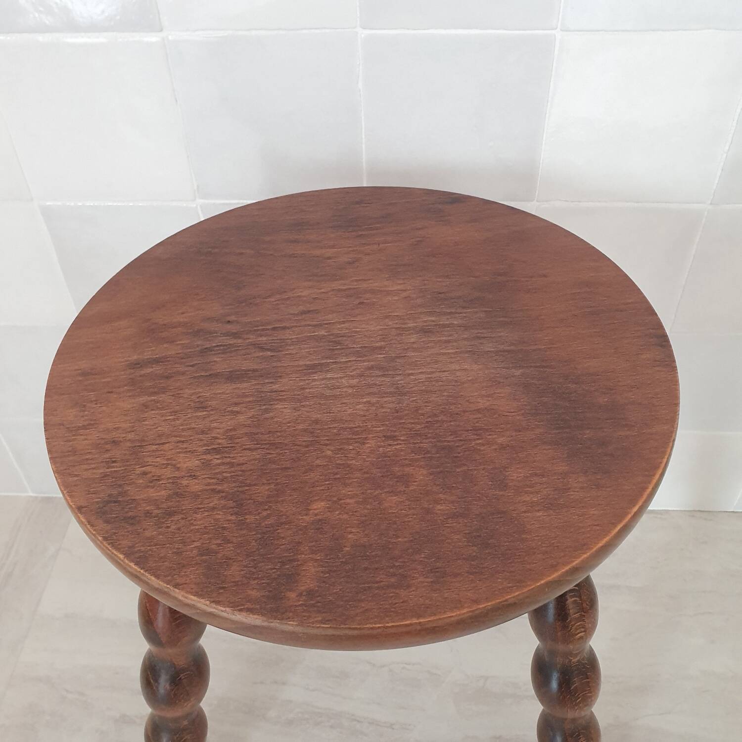 Turned wooden stool / tripod with round seat