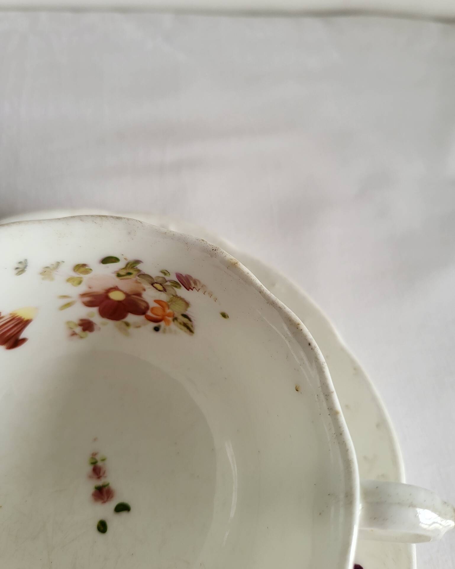 Antique Cup and Saucer in Porcelain with Hand-Painted Floral Decoration