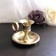 Hand candle holder called "Cave Rat" vintage golden brass