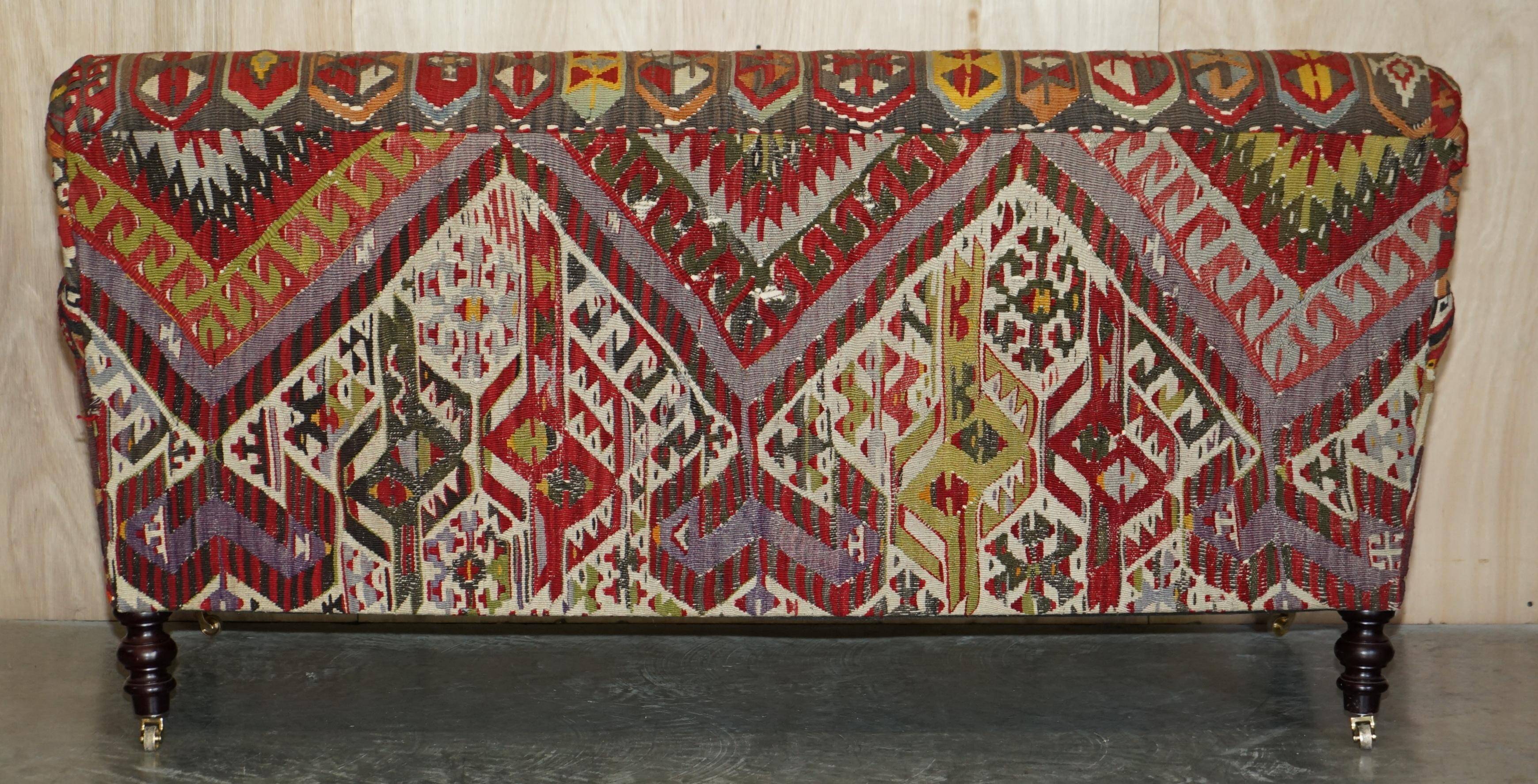 Vintage three-seater canapé by George Smith upholstered in Kilim with feather cushions.