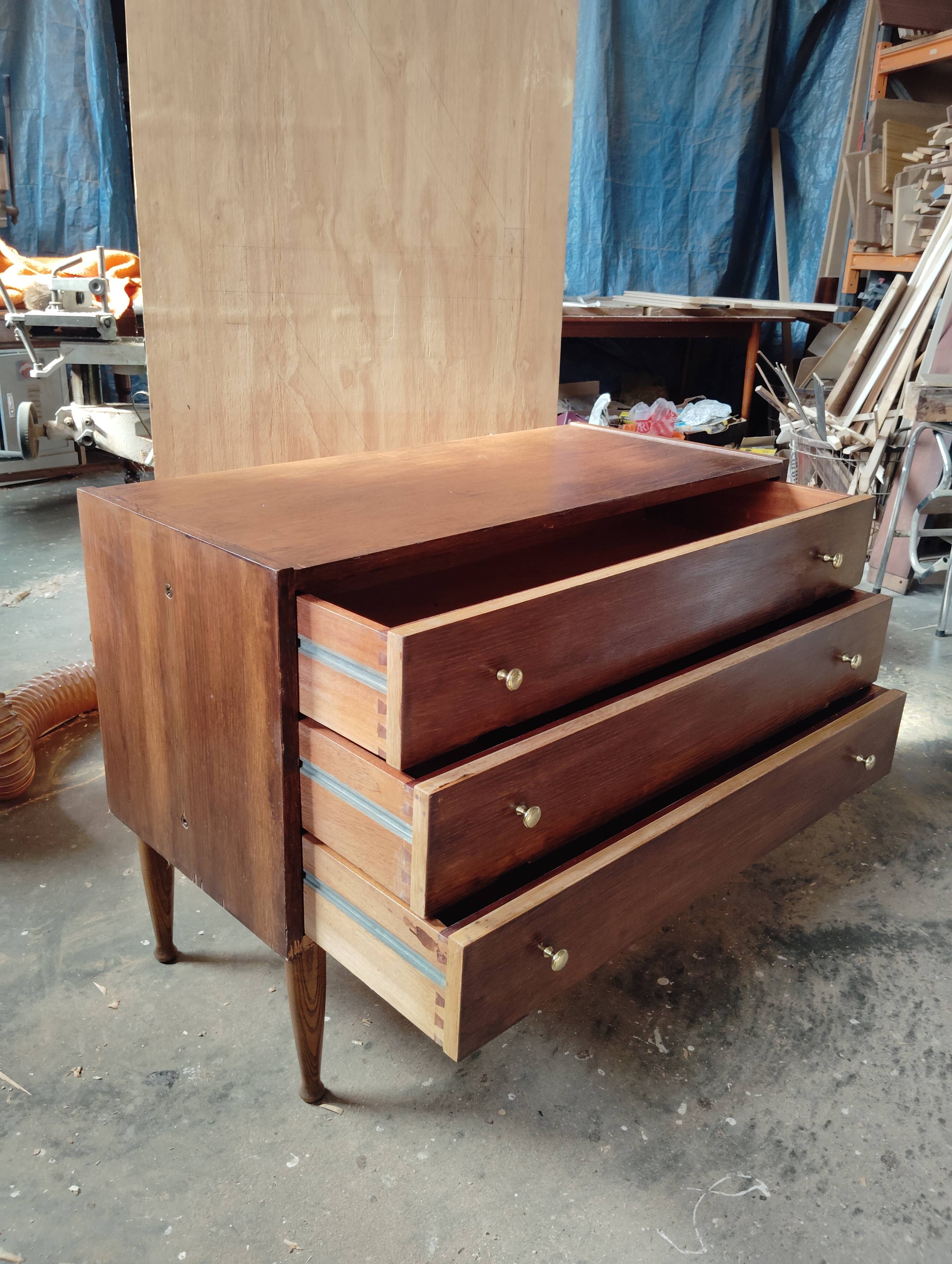 Vintage commode with tapered legs.