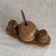 Condiment service (salt, pepper, and mustard) in olive wood