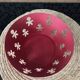 Rose metal catch-all with character inclusions by A di Alessi, 9cm high x 21.5cm diameter.