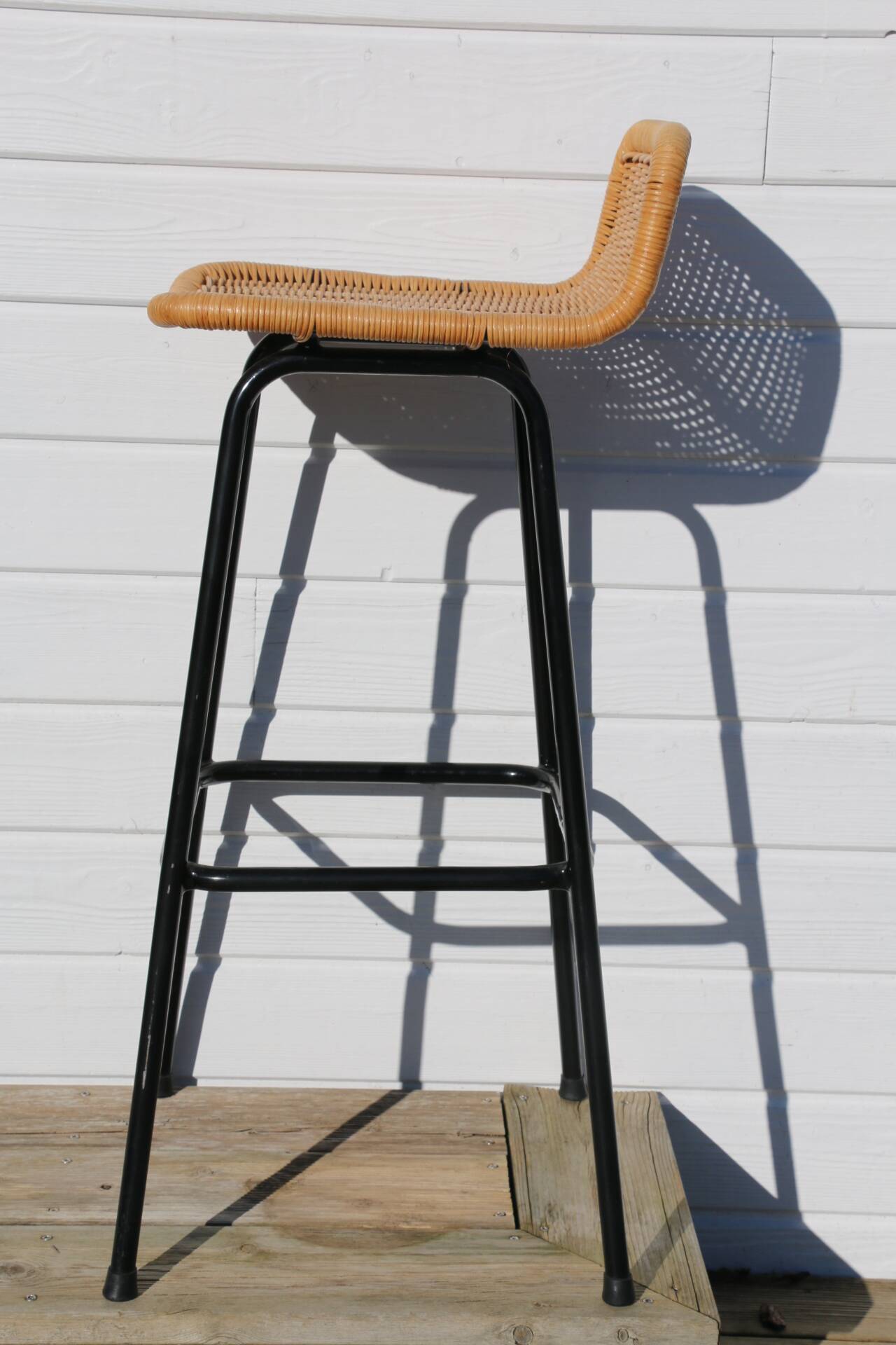 3 rattan and black metal stools dirk van sliedregt