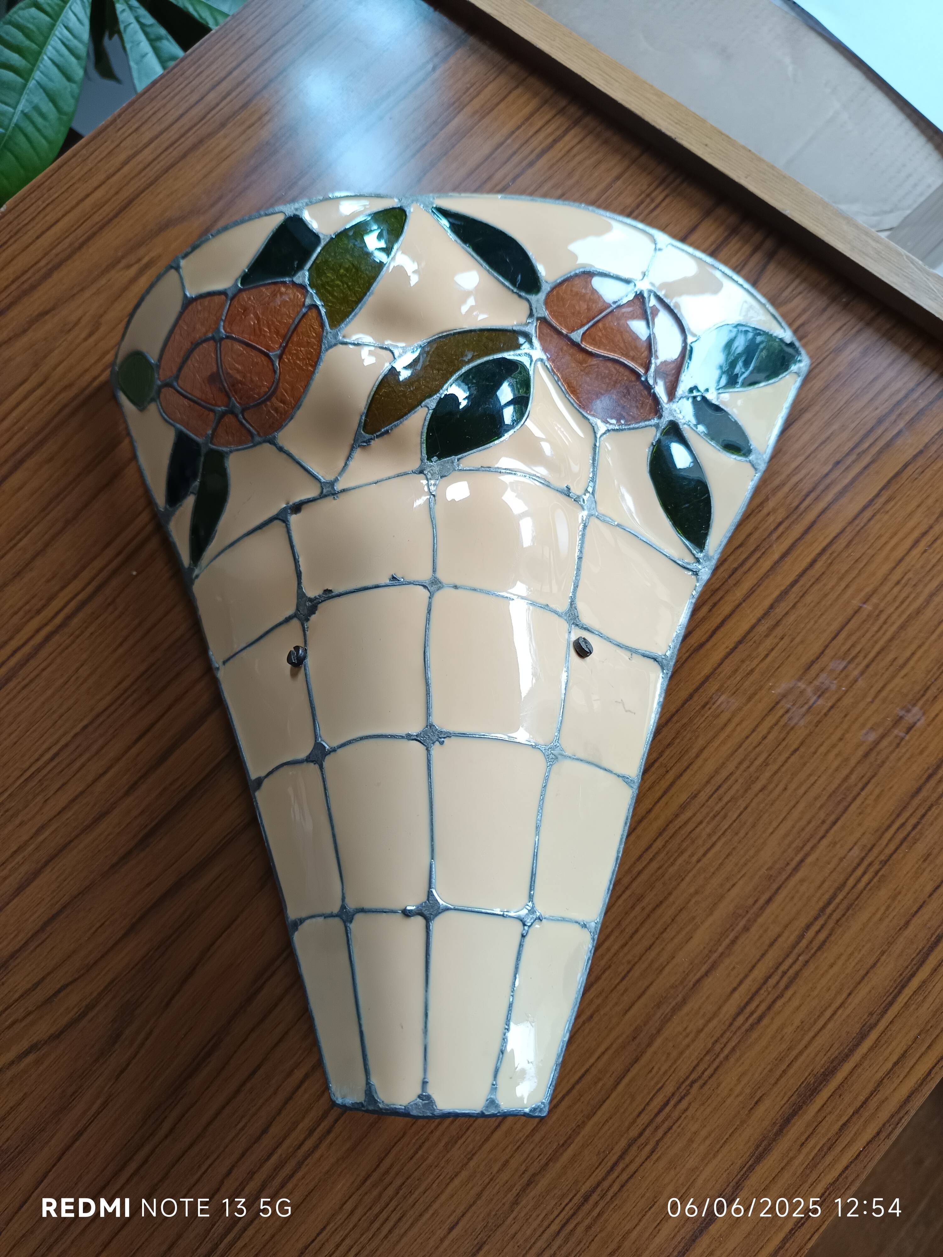 Stained glass and brass wall light from the 1970s