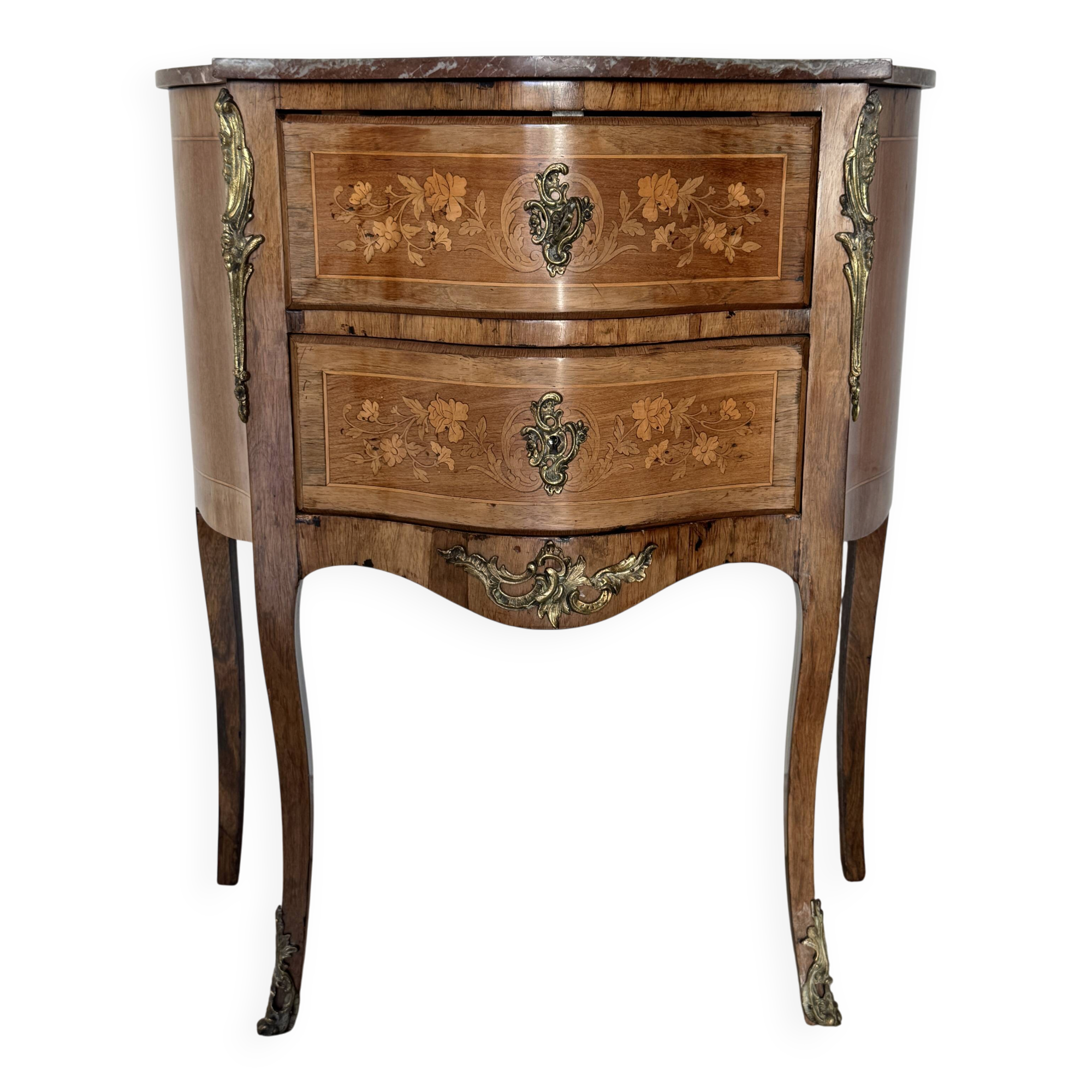 Small curved chest of drawers in Louis XV style