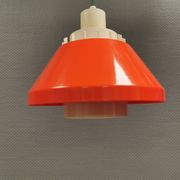 An orange pendant lamp made from hard-pressed ABS plastic. Denmark 1970s