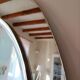 Vintage oval smoked glass mirror