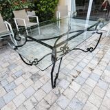 Large rectangular table in cast iron and glass top