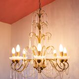 Large golden Italian chandelier with white opaline drops.