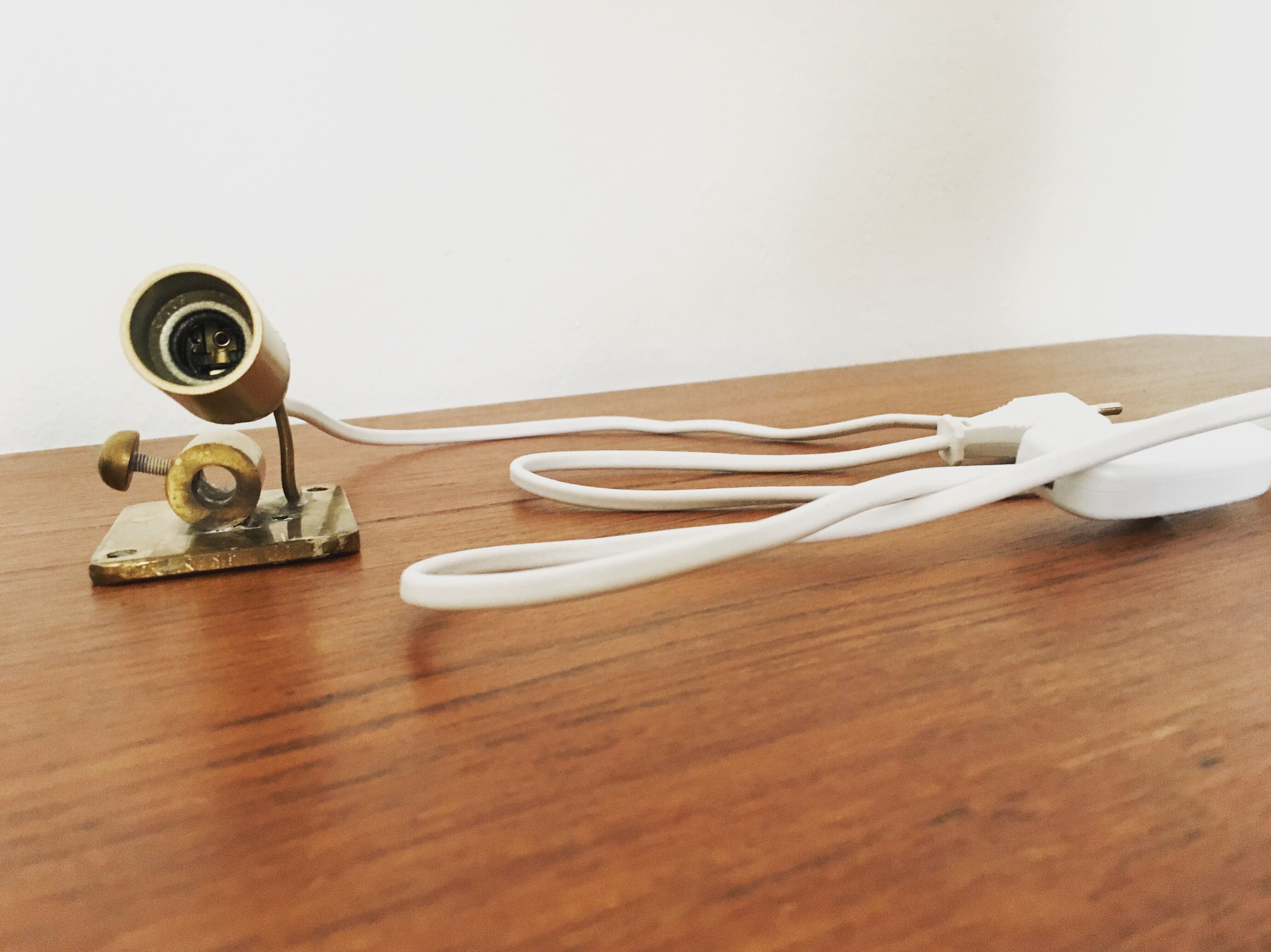 Hollywood Regency brass leaf wall lamp