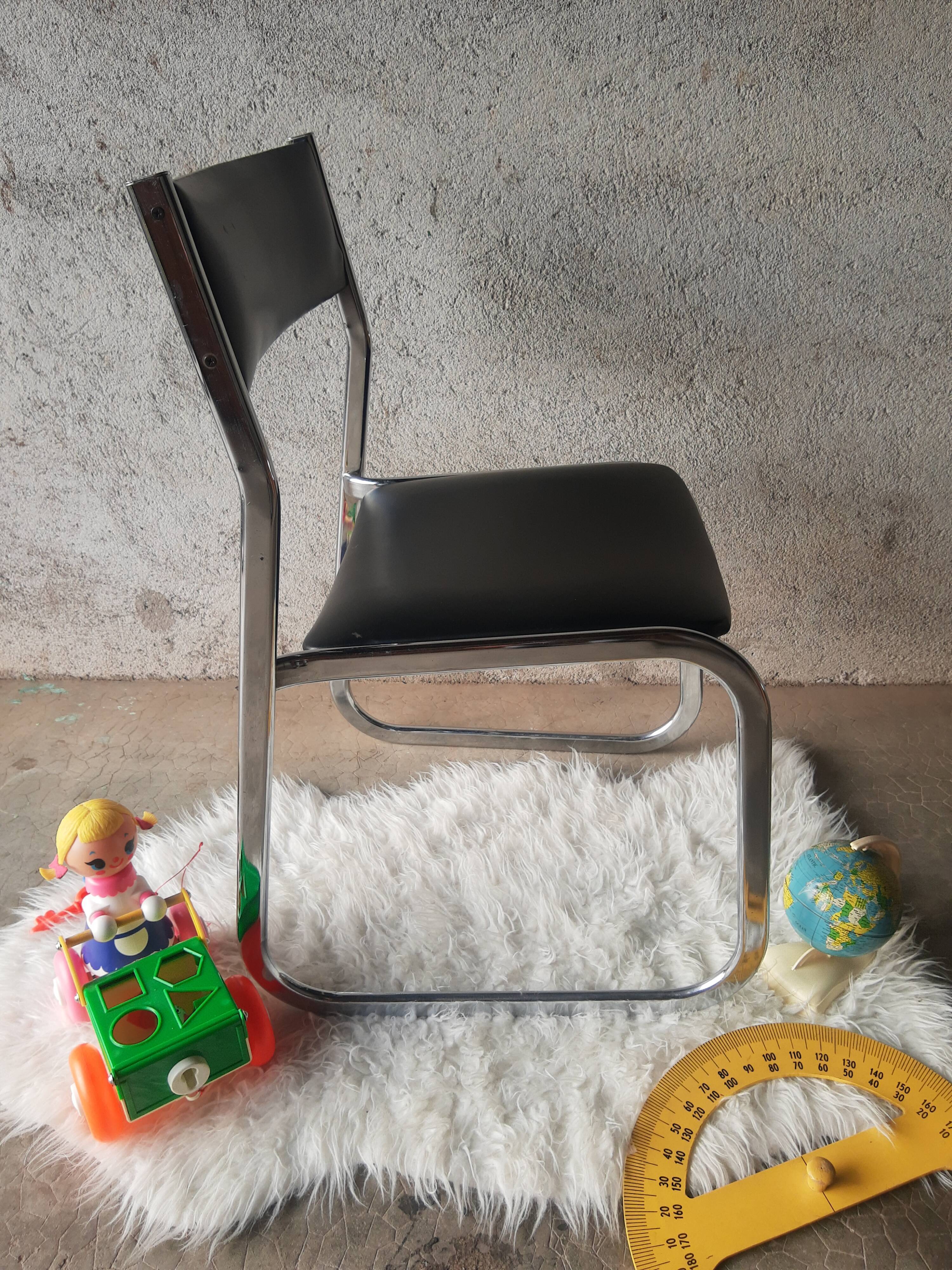 Vintage 70s black skai sled chair