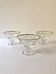 Trio of glass dessert bowls with gold rims, La Rochère, France