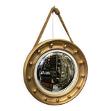 Witch mirror porthole style in gilded wood, diameter 44 cm.