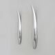 Pair of designer wall sconces in aluminium in the style of Lucien Gau.