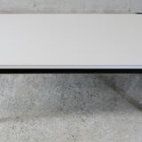 Coffee table chrome steel base, white melaminate top. France, circa 1970.