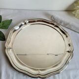 Round silver-plated serving dish with a glass base.