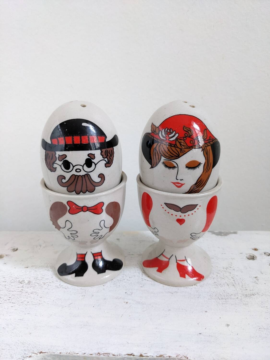 Egg cup, salt and pepper shaker duo