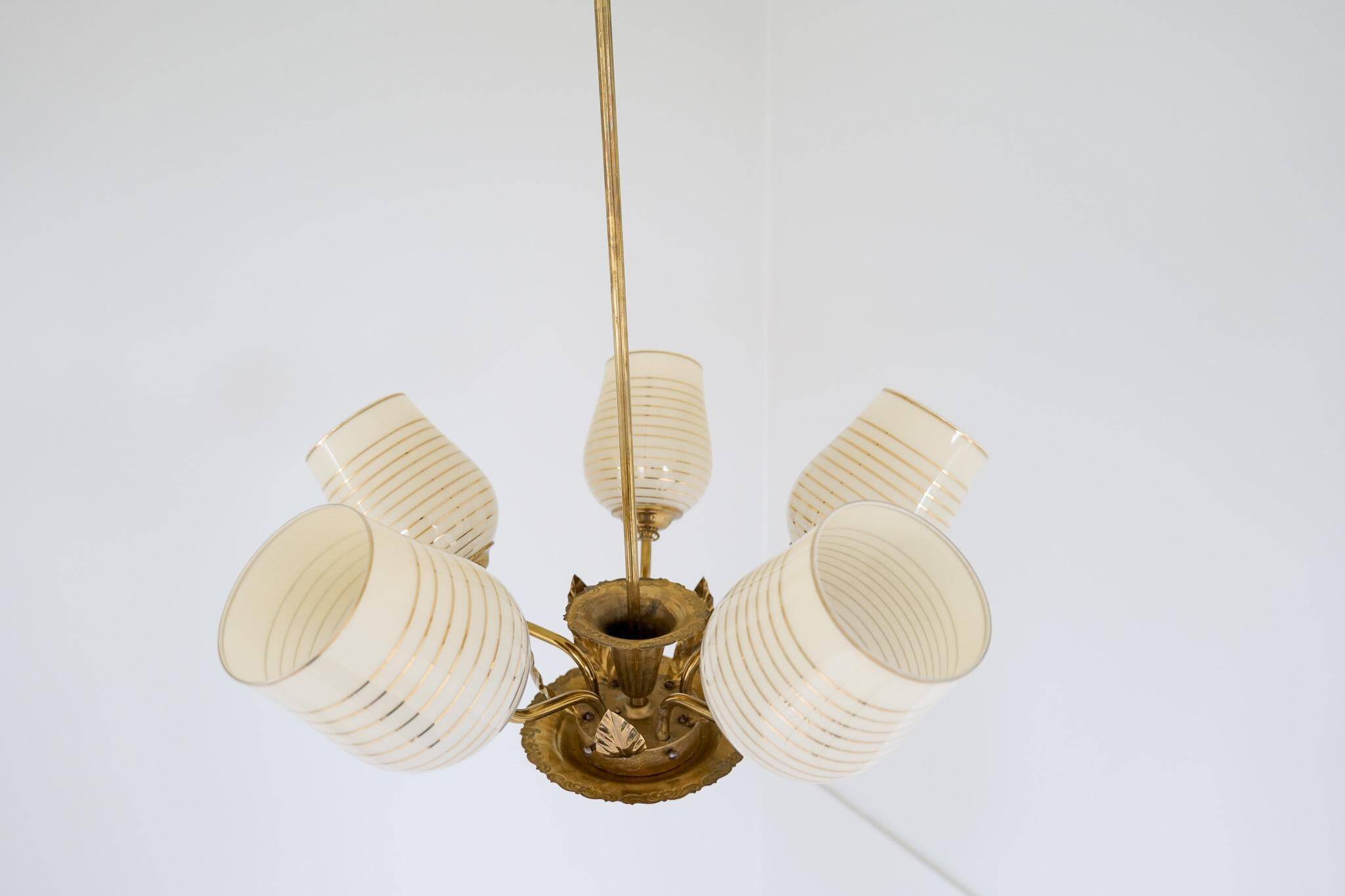 Mid-century brass and glass pendant light by Sario, Finland, 1950s.