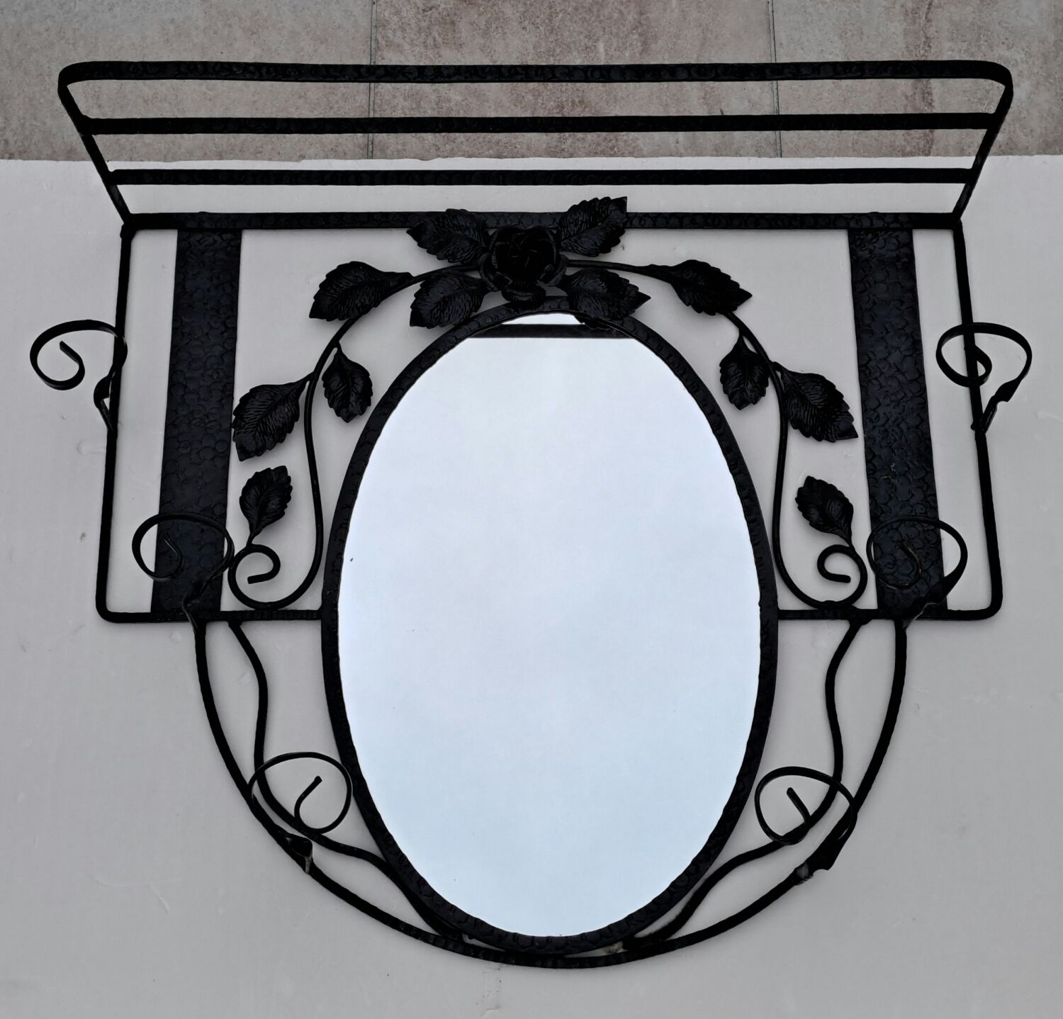 Wrought iron wall coat rack