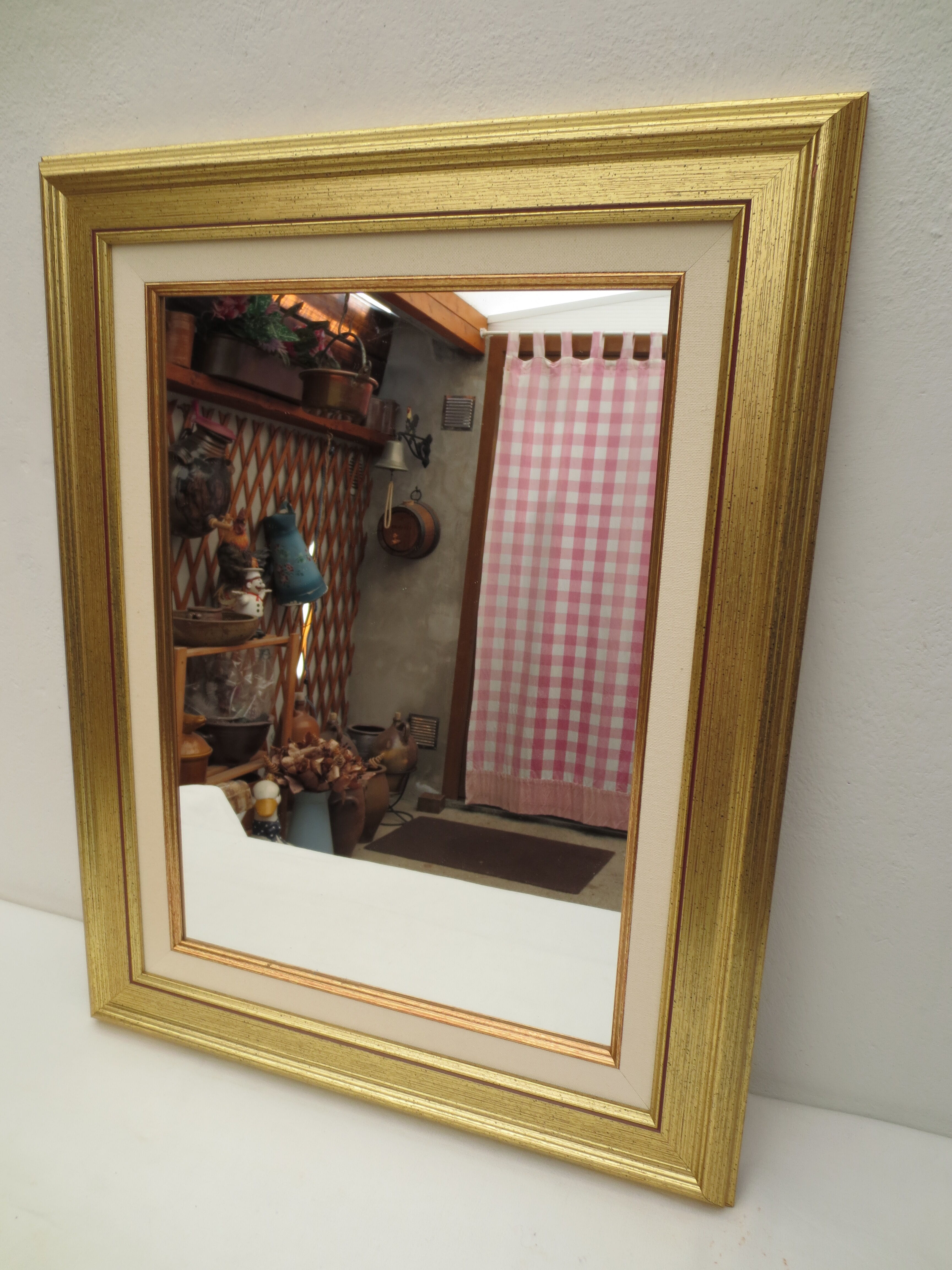 Rectangular mirror, gilded wood tower