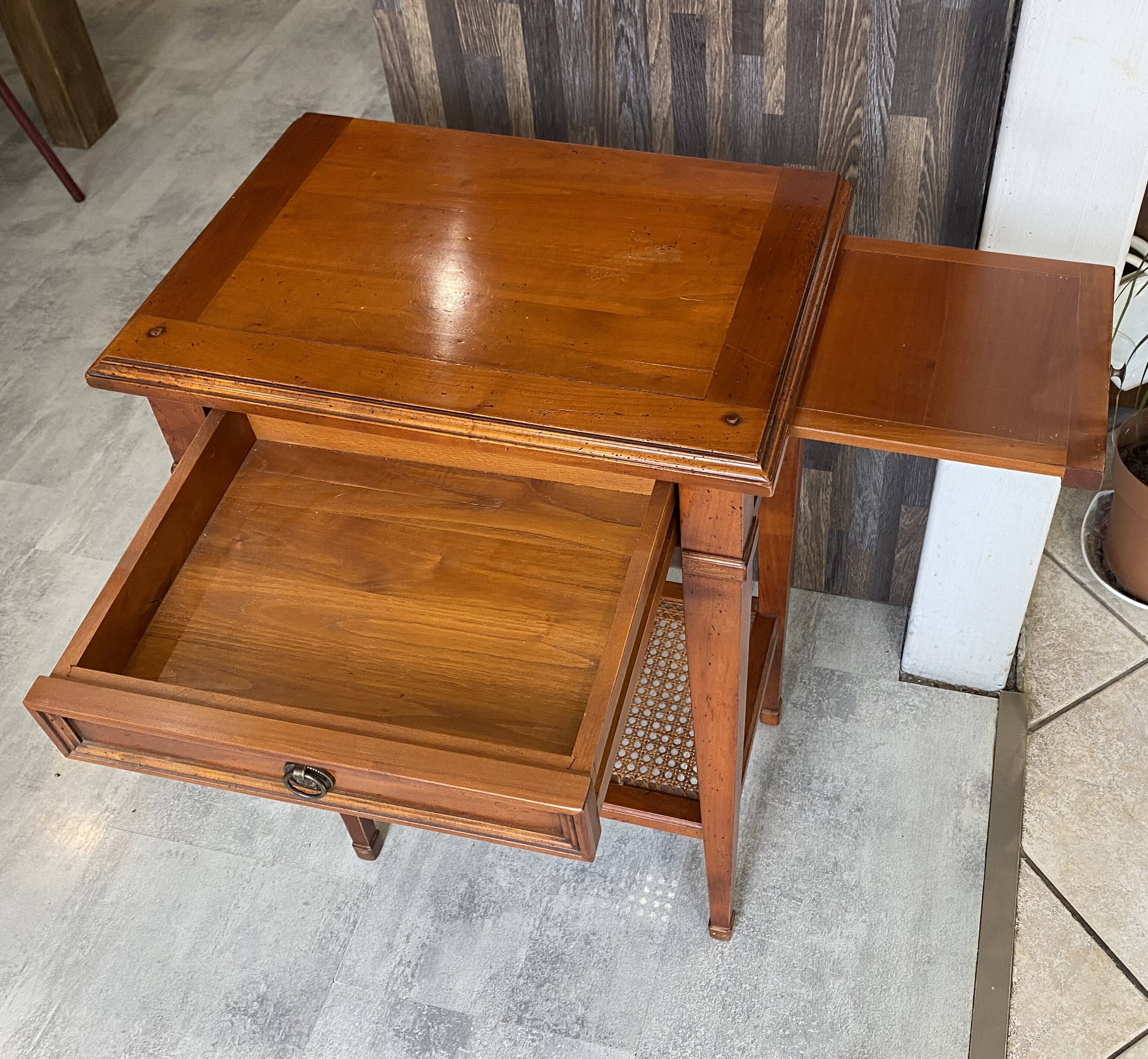 Occasional table in cherry wood, 1 drawer, 1 cane shelf, 1950.
