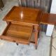Occasional table in cherry wood, 1 drawer, 1 cane shelf, 1950.