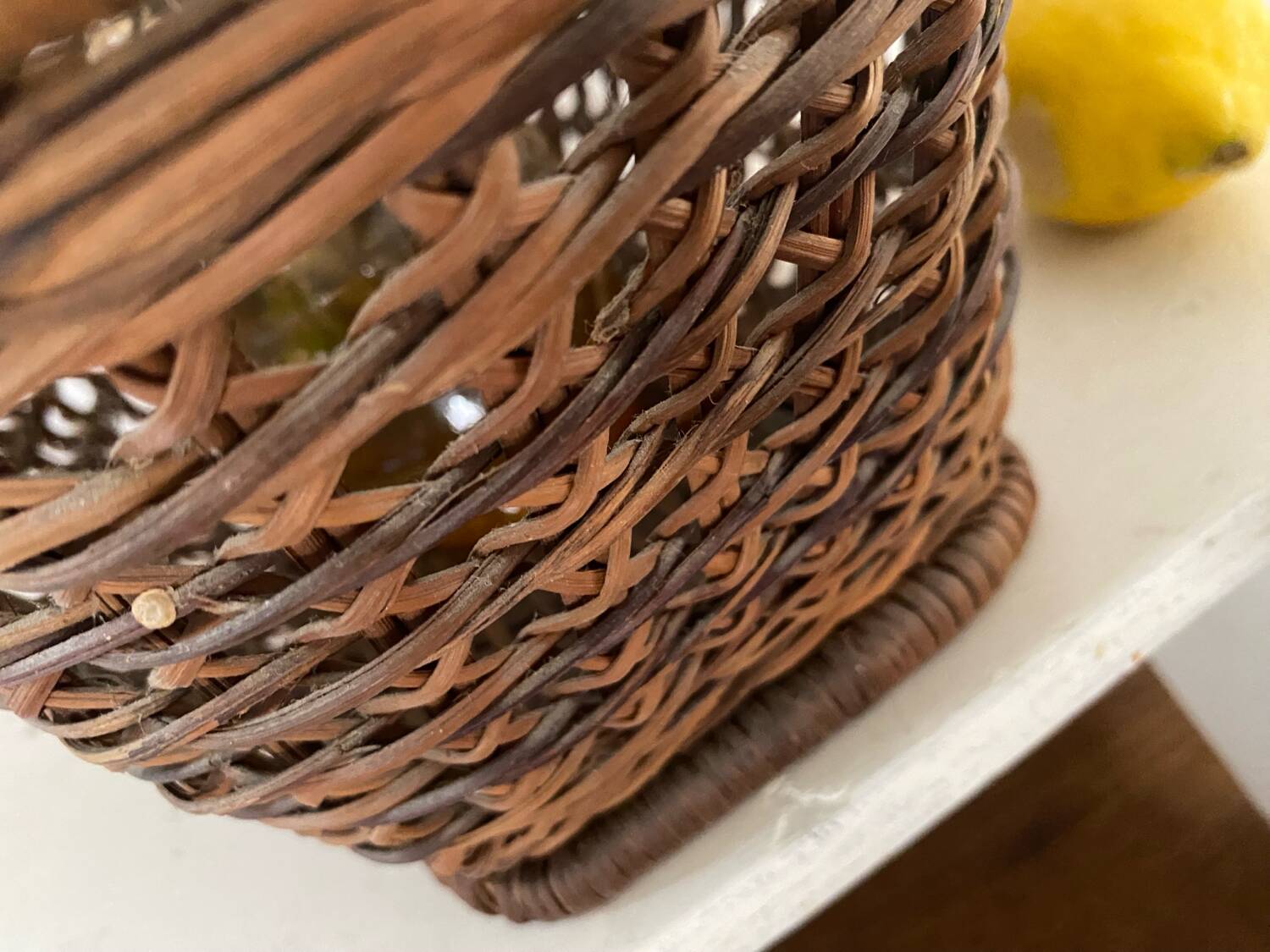 Vintage wicker and cane basket in bohemian style