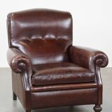 Fauteuil anglais ancien en cuir de mouton