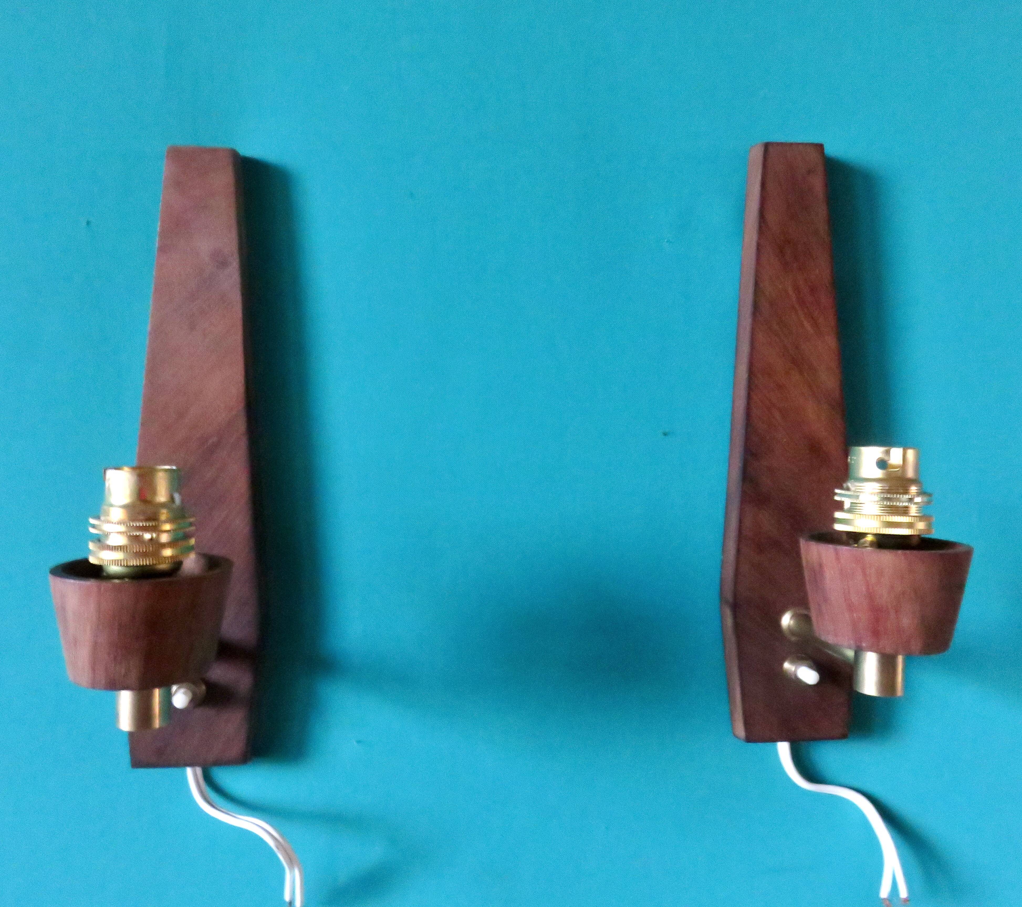 Pair of "Vitrika" rosewood wall sconces with turquoise shades. Denmark, 1960