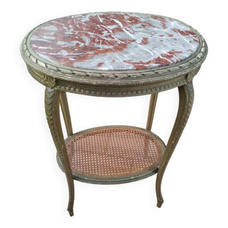 Old oval table with marble top, Louis XVI style