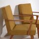 2 armchairs in wood and ochre fabric, 1950