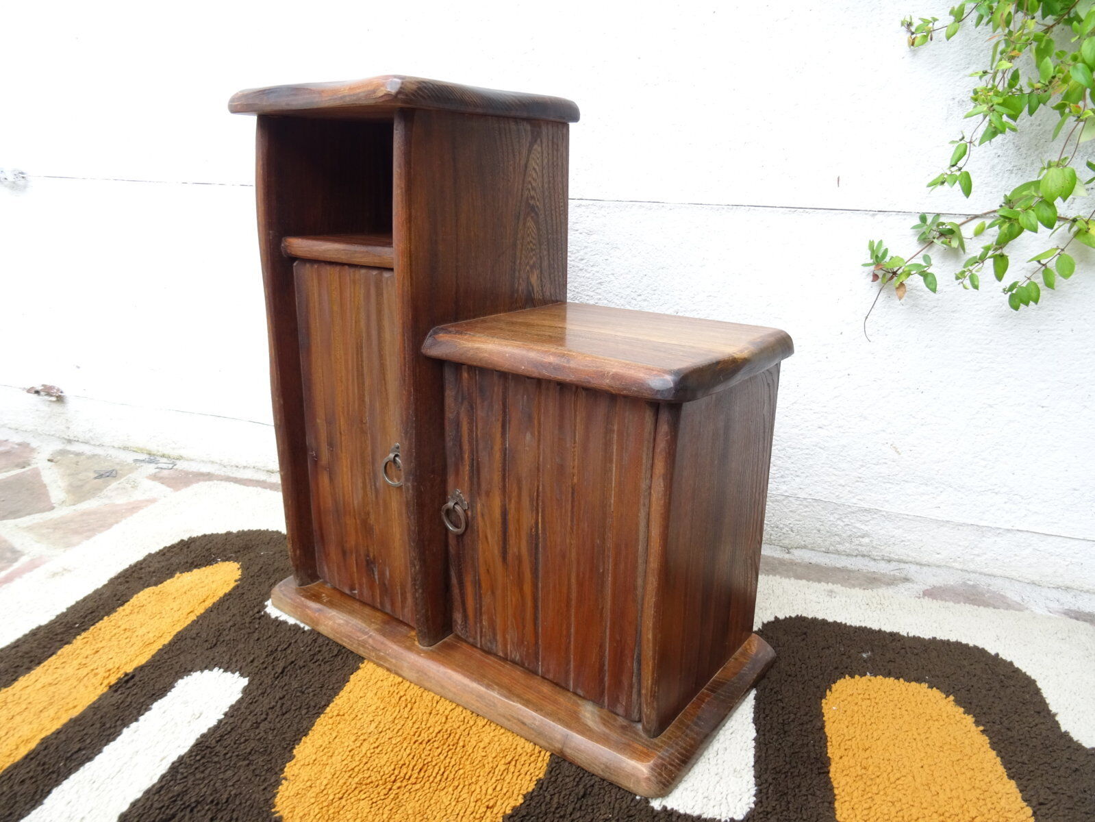 Asymmetrical brutalist furniture in solid elm