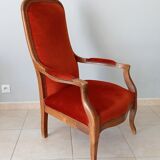 Walnut and velvet voltaire armchair