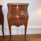 Lot of two rosewood and marble bedside tables