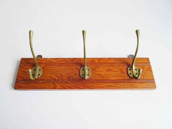 Hook rail made of wood and brass