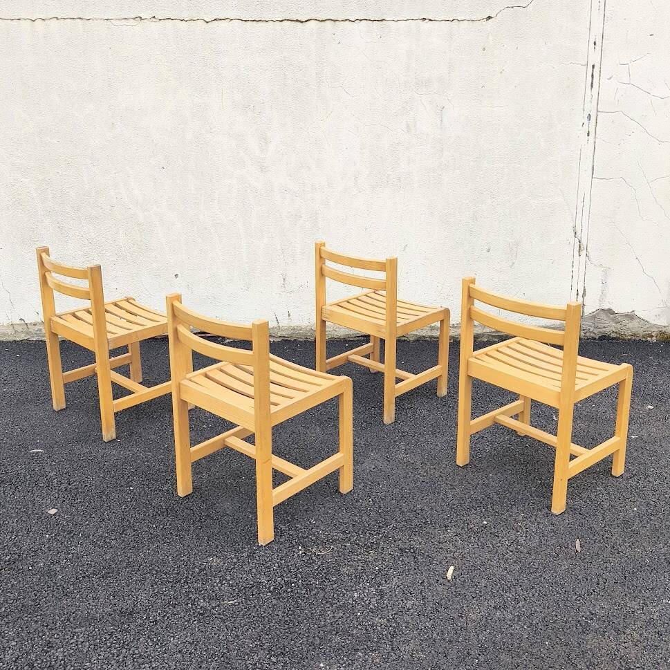 Set of 4 varnished wooden chairs, André Sornay