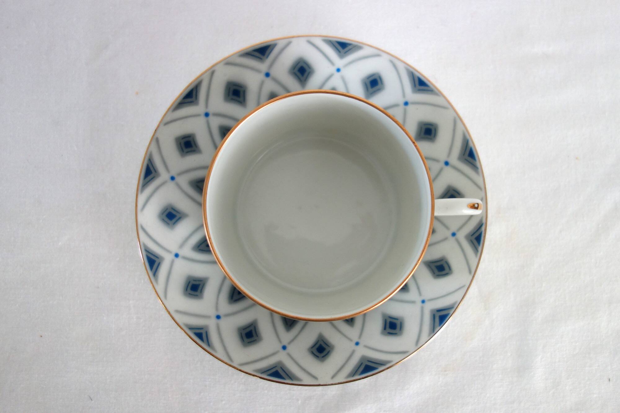 Tasse à thé avec soucoupe en porcelaine de Limoges années 30