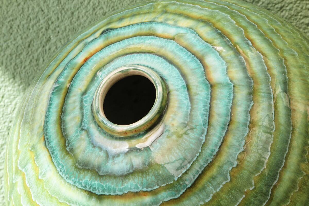 Glazed ceramic ball lamp base, green gradients.