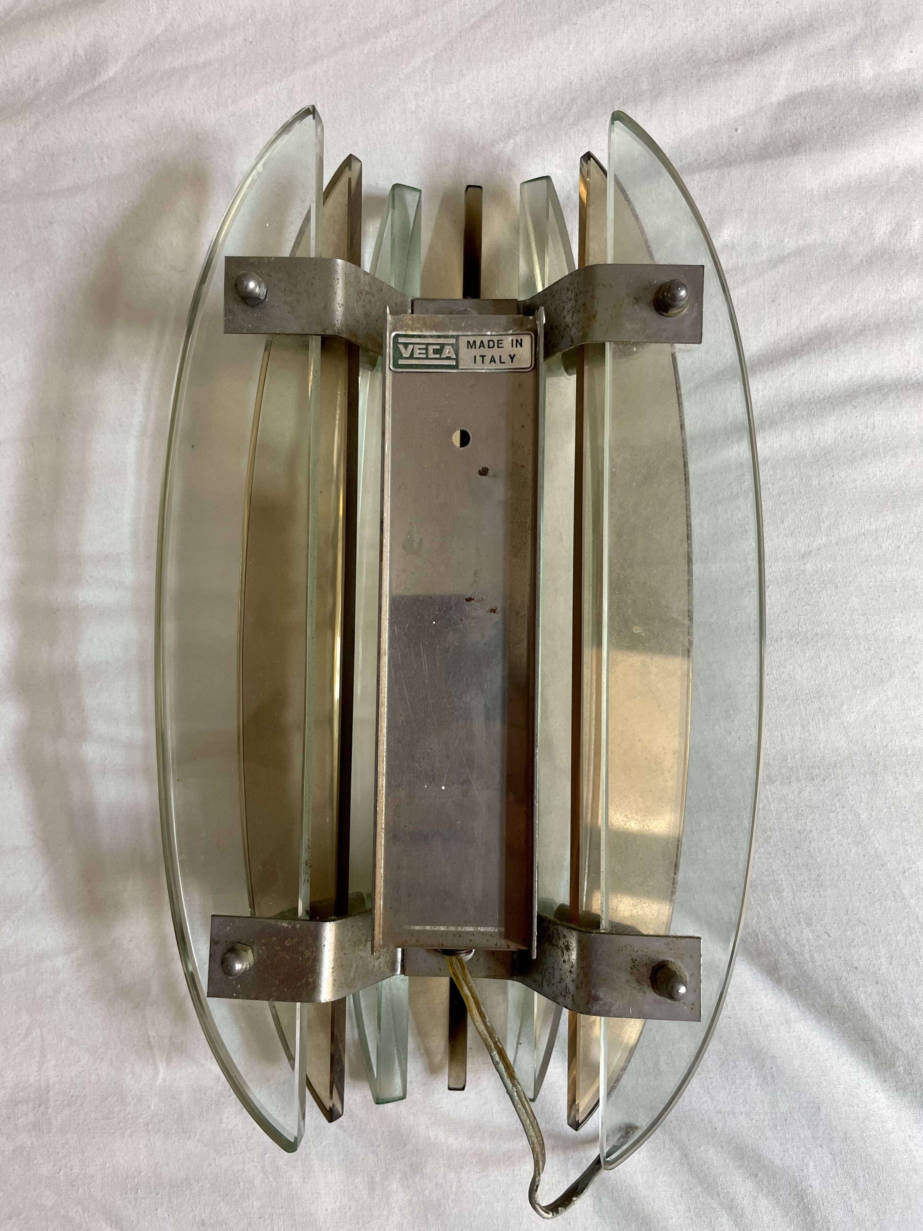 Pairs of VECA wall lights