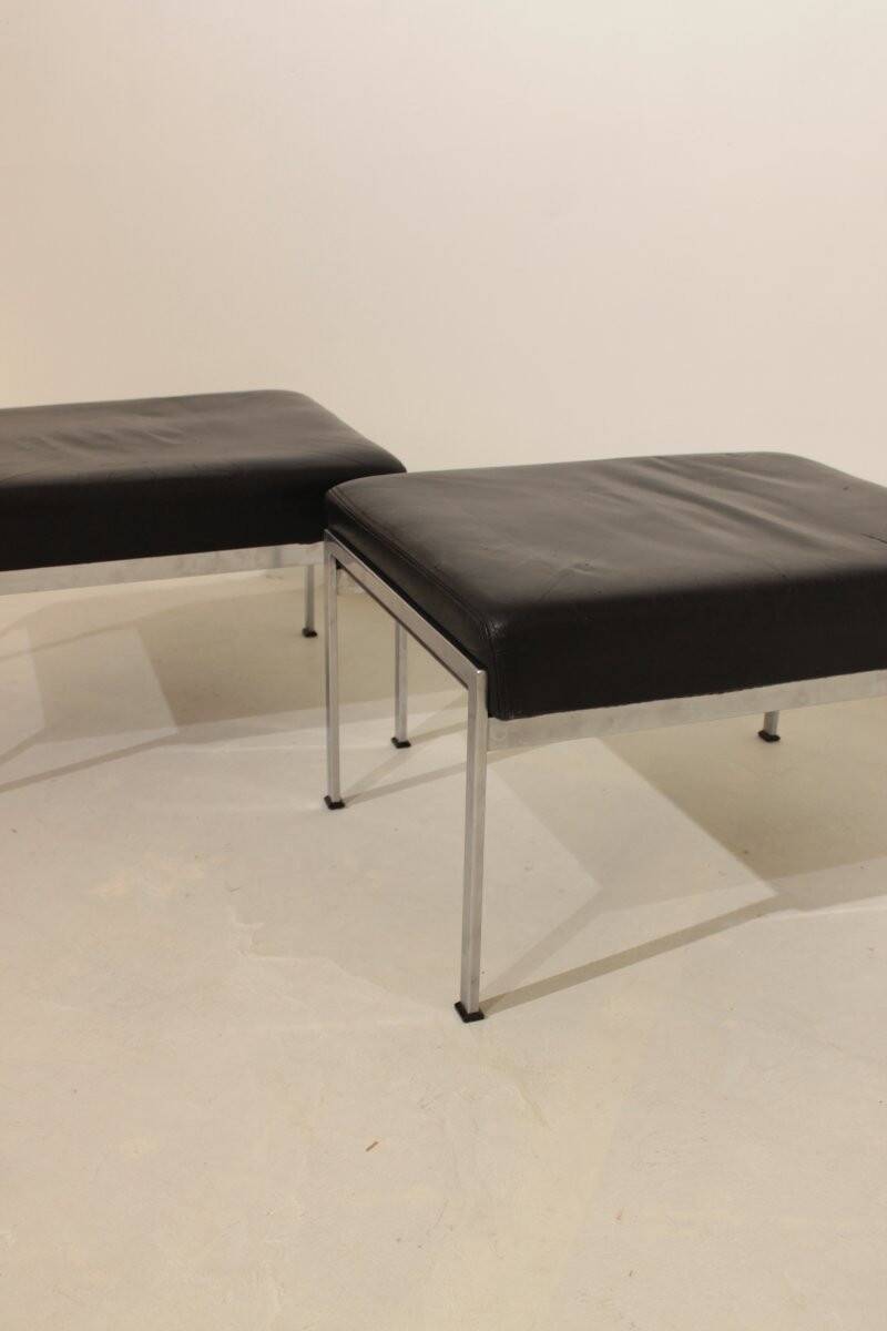 Pair of designer leather and brushed stainless steel footrests - Rob Parry
