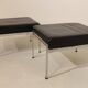 Pair of designer leather and brushed stainless steel footrests - Rob Parry