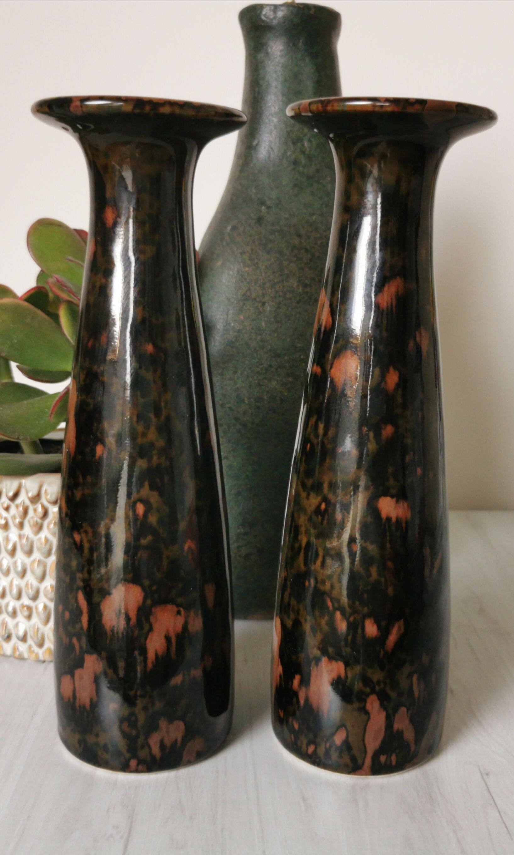 Pair of enamelled ceramic candlesticks