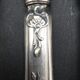 12 silver metal table knives model Rocaille