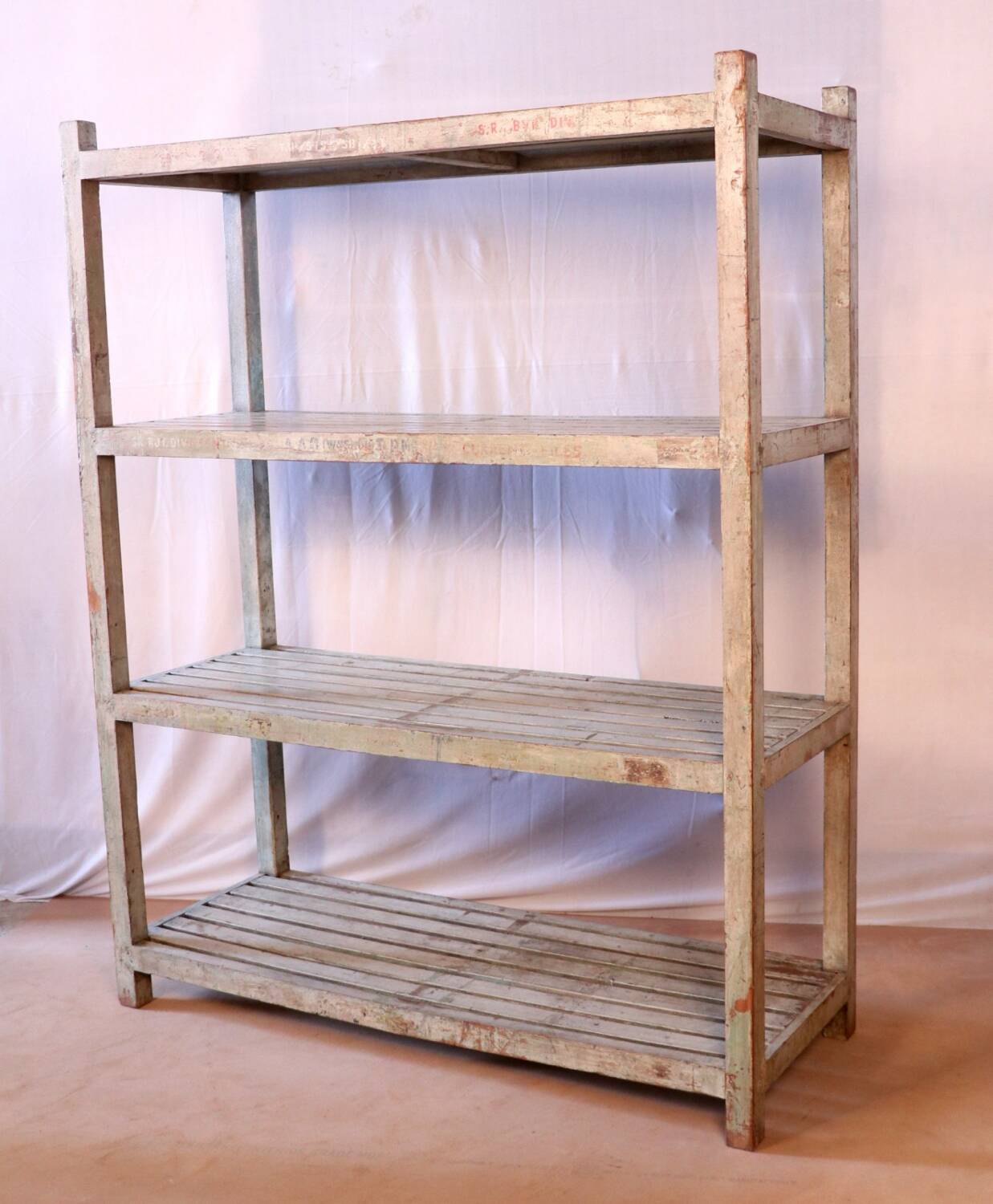 Teak bookshelf with original off-white patina.