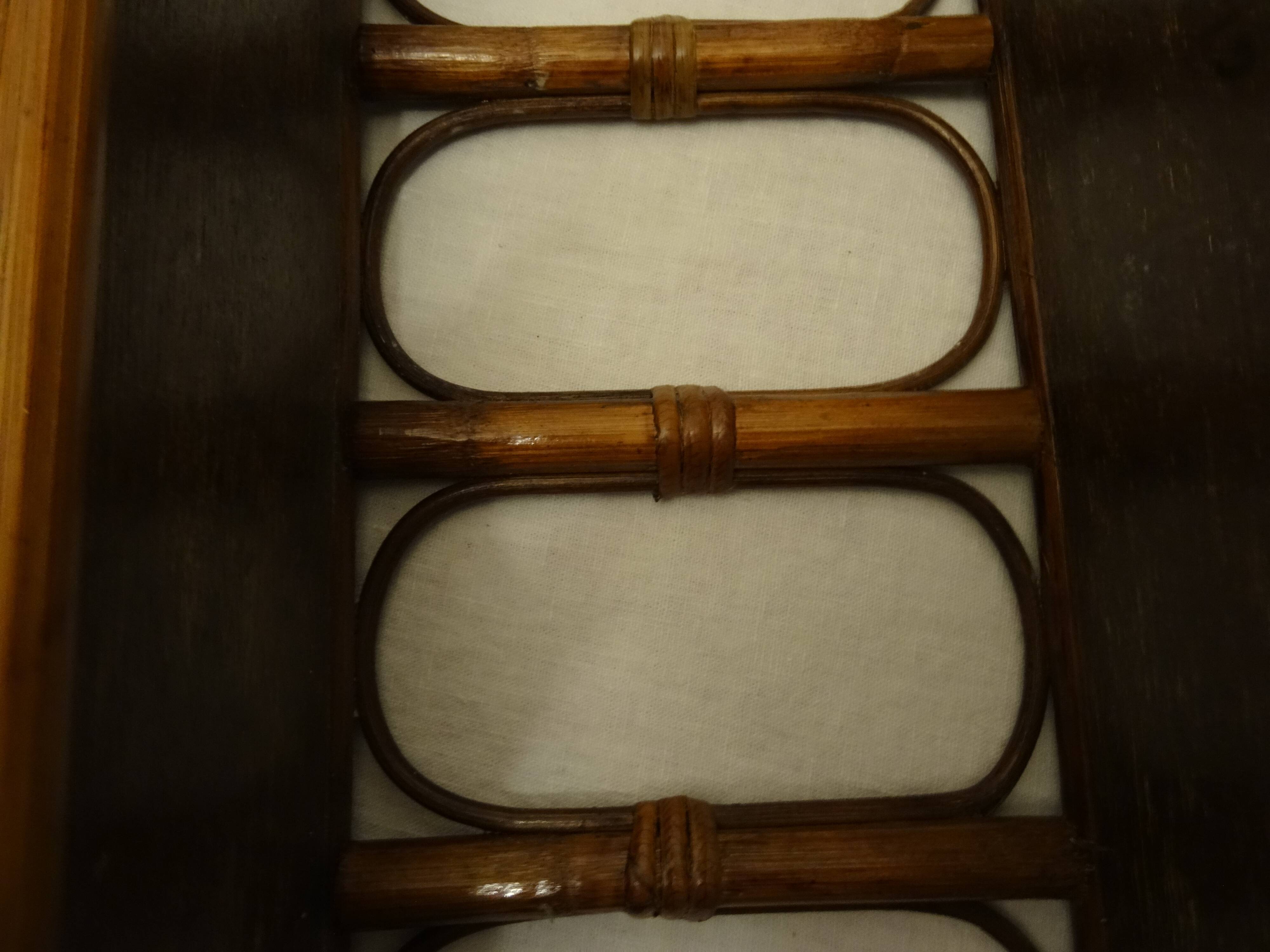 Varnished rattan wall shelf
