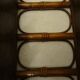 Varnished rattan wall shelf