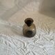 Vintage smoked glass carafe with engraved decoration.